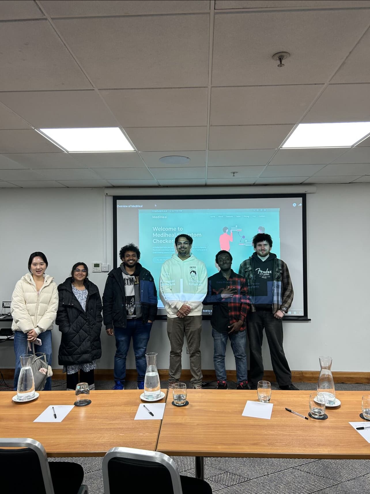 Hackathon team presenting their project